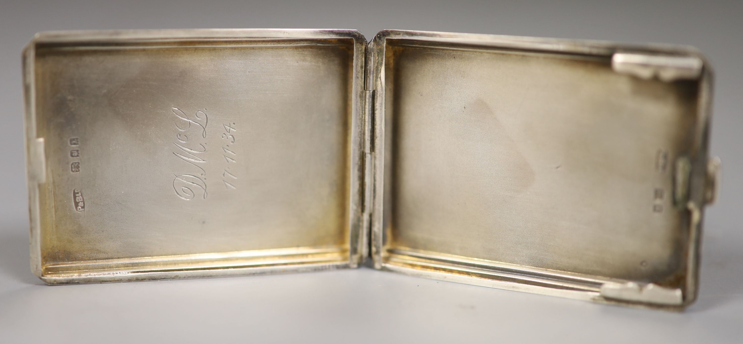 A Victorian engine turned silver card case, Birmingham, 1866 and a George V silver small card case, 63mm.